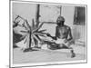 Mahatma Gandhi Indian Nationalist and Spiritual Leader Spins at a Wheel in 1931-null-Mounted Art Print