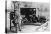 Mail Carrier with "United Mail" Automobile Photograph-Lantern Press-Stretched Canvas