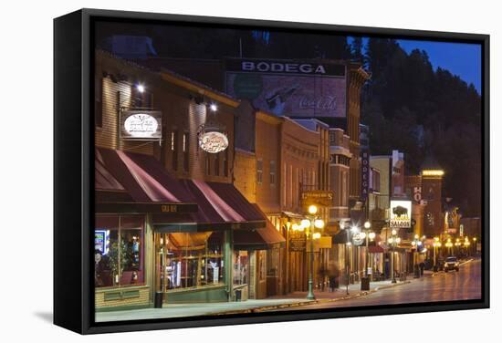 Main Street at Dusk, Deadwood, South Dakota, USA-Walter Bibikow-Framed Stretched Canvas