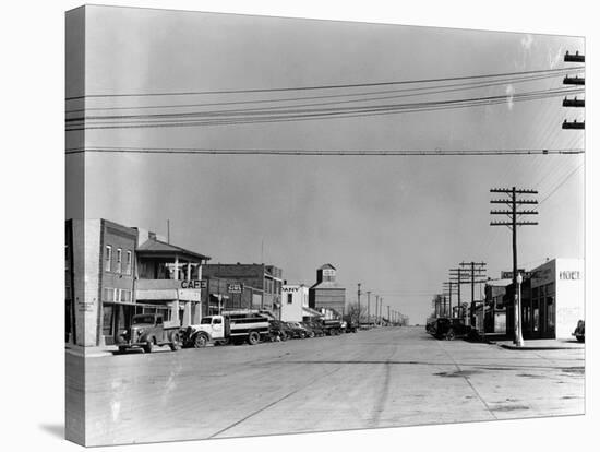 Main Street of Sublette, Kansas, in April 1941-Irving Rusinow-Stretched Canvas