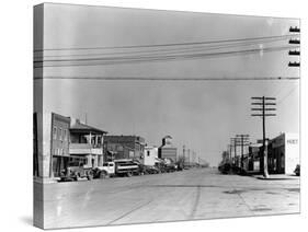 Main Street of Sublette, Kansas, in April 1941-Irving Rusinow-Stretched Canvas