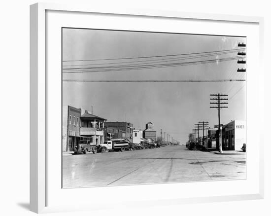 Main Street of Sublette, Kansas, in April 1941-Irving Rusinow-Framed Photographic Print