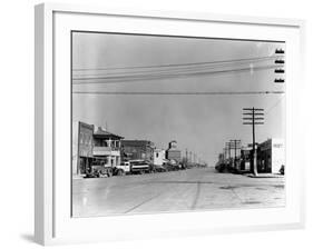 Main Street of Sublette, Kansas, in April 1941-Irving Rusinow-Framed Photographic Print