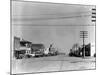 Main Street of Sublette, Kansas, in April 1941-Irving Rusinow-Mounted Photographic Print