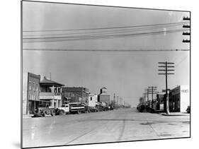 Main Street of Sublette, Kansas, in April 1941-Irving Rusinow-Mounted Photographic Print