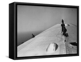 Maintenance Crewmen on Top of Graf Zeppelin repair damage caused Atlantic Ocean Storm during flight-Alfred Eisenstaedt-Framed Stretched Canvas