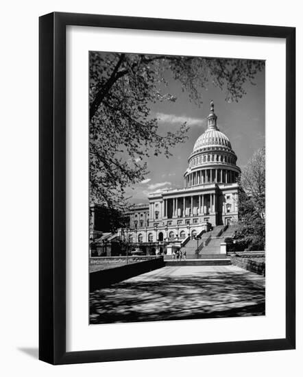 Majestic View of US Capitol Building Framed by Budding Branches of Cherry Trees on a Beautiful Day-Andreas Feininger-Framed Photographic Print