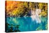 Majestic View on Waterfall with Turquoise Water and Sunny Beams in Plitvice Lakes National Park. Fo-Leonid Tit-Stretched Canvas