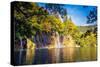 Majestic View on Waterfall with Turquoise Water and Sunny Beams in the Plitvice Lakes National Park-Leonid Tit-Stretched Canvas