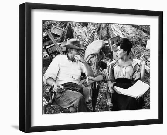 MAJOR DUNDEE, 1965 directed by SAM PECKINPAH On the set, Sam Peckinpah with Senta Berger (b/w photo-null-Framed Photo