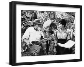 MAJOR DUNDEE, 1965 directed by SAM PECKINPAH On the set, Sam Peckinpah with Senta Berger (b/w photo-null-Framed Photo