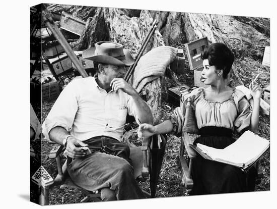 MAJOR DUNDEE, 1965 directed by SAM PECKINPAH On the set, Sam Peckinpah with Senta Berger (b/w photo-null-Stretched Canvas