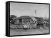 Major Sidney Shelley and His Family Living in a "Typhoonized" Quonset Hut-Carl Mydans-Framed Stretched Canvas