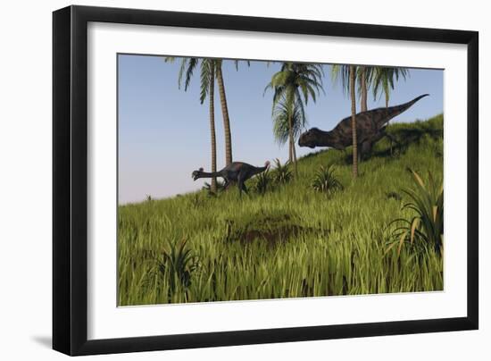 Majungasaurus Chasing a Gigantoraptor-null-Framed Art Print