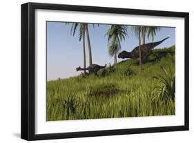 Majungasaurus Chasing a Gigantoraptor-null-Framed Art Print