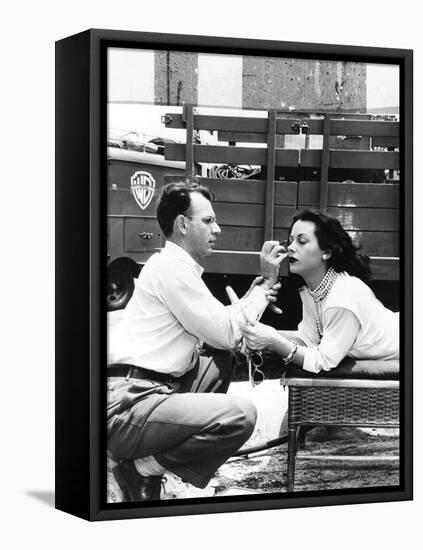 Makeup Artist Ben Nye Applying Eye Makeup to Actress Hedy Lamarr Who Observes in a Mirror-null-Framed Stretched Canvas