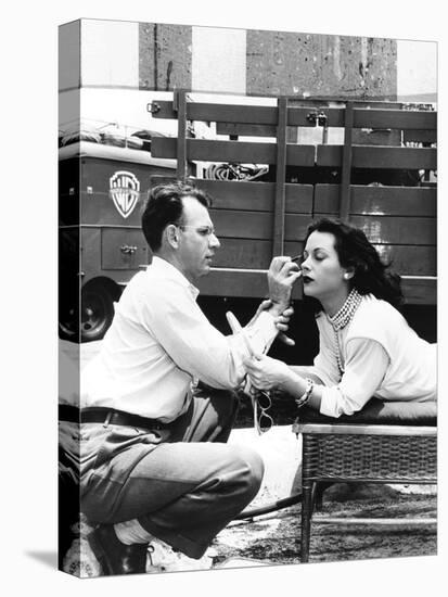 Makeup Artist Ben Nye Applying Eye Makeup to Actress Hedy Lamarr Who Observes in a Mirror-null-Stretched Canvas