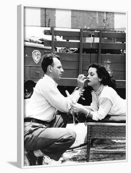 Makeup Artist Ben Nye Applying Eye Makeup to Actress Hedy Lamarr Who Observes in a Mirror-null-Framed Photo