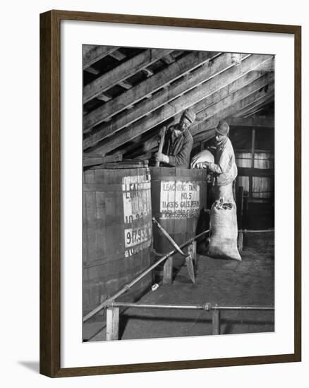 Making Jack Daniels Whiskey at His Distillery, Showing the Leaching Process with Charcoal-null-Framed Photographic Print