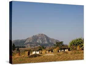Malawi, Dedza, Grass-Roofed Houses in a Rural Village in the Dedza Region-John Warburton-lee-Stretched Canvas