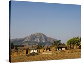 Malawi, Dedza, Grass-Roofed Houses in a Rural Village in the Dedza Region-John Warburton-lee-Stretched Canvas