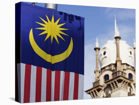 Malaysian Flag and Old Kl Railway Station, Kuala Lumpur, Malaysia, Southeast Asia, Asia-Christian Kober-Stretched Canvas