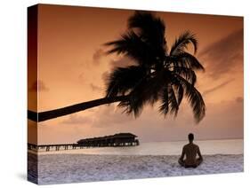 Maldives, Meemu Atoll, Medhufushi Island, Man Meditating on the Beach (Mr)-Michele Falzone-Stretched Canvas
