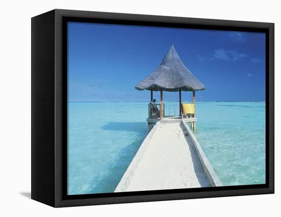 Maldives, Pier and Ocean-Peter Adams-Framed Stretched Canvas