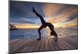 Maldives, South Ari Atoll, Thudufushi Island, Diamonds Thudufushi Resort, woman practising Yoga at -Michele Falzone-Mounted Photographic Print