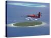 Maldivian Air Taxi Flying Above Island, Maldives, Indian Ocean, Asia-Sakis Papadopoulos-Stretched Canvas