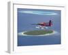 Maldivian Air Taxi Flying Above Island, Maldives, Indian Ocean, Asia-Sakis Papadopoulos-Framed Photographic Print