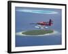 Maldivian Air Taxi Flying Above Island, Maldives, Indian Ocean, Asia-Sakis Papadopoulos-Framed Photographic Print