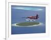 Maldivian Air Taxi Flying Above Island, Maldives, Indian Ocean, Asia-Sakis Papadopoulos-Framed Photographic Print