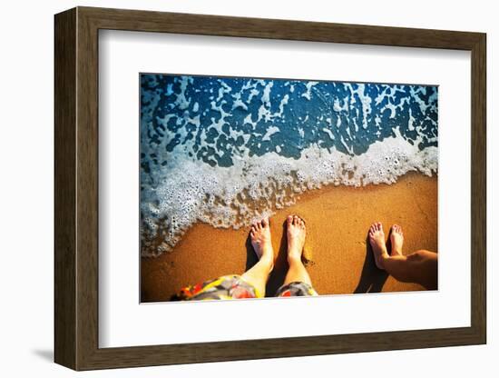 Male and Female Feet are Standing on the Sandy Beach-Nomad Soul-Framed Photographic Print