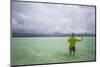 Male Angler and Guide Wade the Flats with Approaching Storm-Matt Jones-Mounted Photographic Print