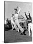 Male Cheerleaders in Action at Wisconsin-Marquette Football Game-Alfred Eisenstaedt-Stretched Canvas