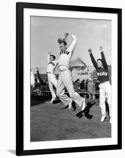 Male Cheerleaders in Action at Wisconsin-Marquette Football Game-Alfred Eisenstaedt-Framed Photographic Print