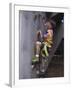 Male Child Wall Climbing Indoors-null-Framed Photographic Print