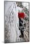 Male Climber Leads Up a Vertical Frozen Waterfall in a Snow Storm, Vail, Colorado-Daniel Gambino-Mounted Photographic Print
