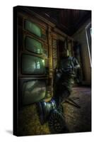 Male Figure in Abandoned Building with Televisions-Nathan Wright-Stretched Canvas