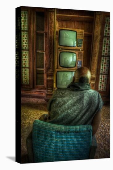 Male Figure in Abandoned Building with Televisions-Nathan Wright-Stretched Canvas