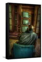 Male Figure in Abandoned Building with Televisions-Nathan Wright-Framed Stretched Canvas