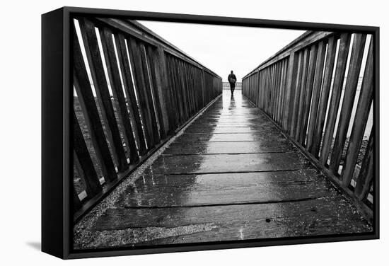 Male Figure Walking on Pier-Sharon Wish-Framed Stretched Canvas