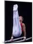 Male Gymnast Performing on the Parallel Bars-null-Mounted Photographic Print