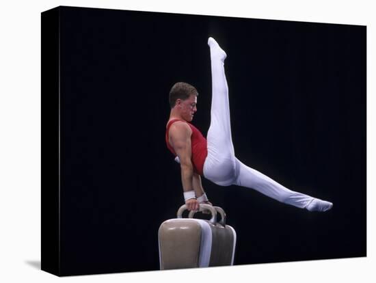 Male Gymnast Performing on the Pomell Horse-null-Stretched Canvas