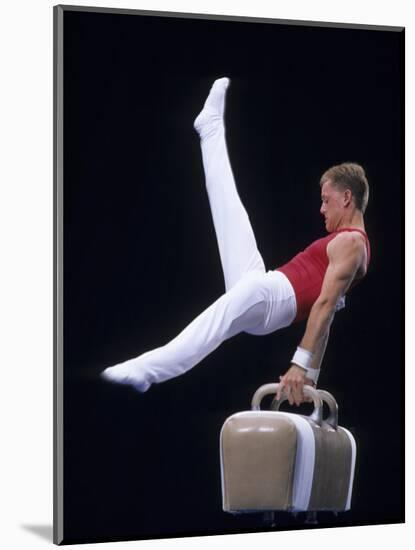 Male Gymnast Performing on the Pomell Horse-null-Mounted Photographic Print