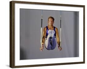 Male Gymnast Performing on the Rings-null-Framed Photographic Print