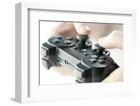 Male Hands Holding Video Game Controller Closeup-elenathewise-Framed Photographic Print