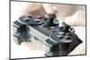 Male Hands Holding Video Game Controller Closeup-elenathewise-Mounted Photographic Print
