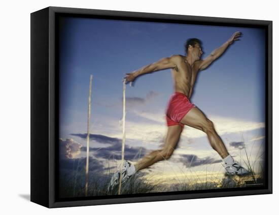 Male Jogger Leaping in a Field-null-Framed Stretched Canvas